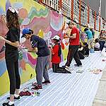After days of working under the heat of the sun and pelting rain, award-winning Malaysian artist Lee Hui Ling and her students revealed a new mural in Kuala Lumpur's historic Chinatown district.

Dubbed as "Wings of Paradise," the mural is part of a global Greenpeace campaign to highlight the plight of Indonesia's rainforests, currently under threat from destructive palm oil production.

Images of the "Birds of Paradise," one of the most iconic species of Indonesia's Papua forests, are now part of the Kuala Lumpur landscape.
