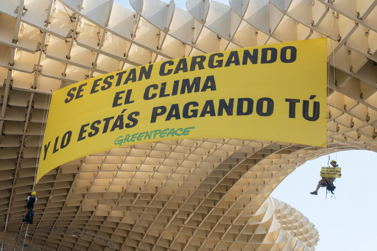 Action at Las Setas ahead of the UN FfD4 Conference in Seville. © Pedro Armestre / Greenpeace