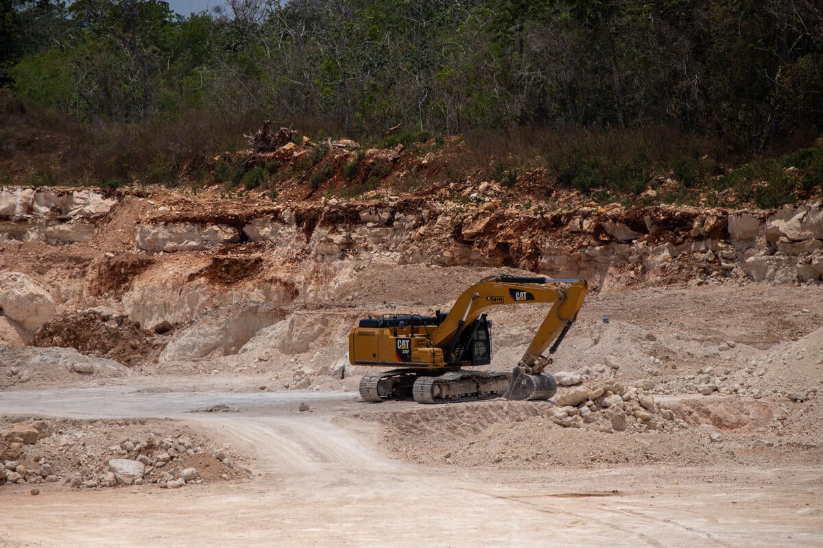 Mining Extraction in the Mayan Jungle. Mining Extraction in the Mayan Jungle.