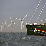 The new Rainbow Warrior sails past the Princess Amalia wind farm, 12 miles from the coast of IJmuiden. The park consists of 60 windmills which are able to supply 125,000 homes with clean energy. As the flagship's maiden voyage continues from Hamburg to Amsterdam.