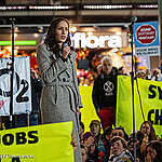 Greenpeace Netherlands campaigner Faiza Oulahsen gives a speech during the event. 
Greenpeace Netherlands organises a 2 day long event called “Protestival” at Schiphol Airport, the largest tax-free gas station in the Netherlands.
Hundreds of activists join the activity at the airport to demand a climate action plan for the climate emergency.