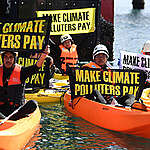 Greenpeace flagship Rainbow Warrior and Filipino climate activists on kayaks block access to the Shell import terminal in Batangas City, Philippines. The twenty-nine activists, including Greenpeace Southeast Asia Executive Director Yeb Saño, closed in on two jetties from different locations, intending to affect the Shell’s import operations. 
A “Make Climate Polluters Pay” banner has also been unfurled on the Greenpeace Rainbow Warrior vessel as they seek reparations for climate impacted communities.