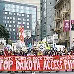 People march in support of the Standing Rock Nation at the Civic Center Plaza of San Francisco. The protest was one of many in a global day of action against the Dakota Access Pipeline (DAPL) calling on the U.S. Army Corps of Engineers to cancel the permit for the project.