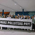 Greenpeace delegation with banner. 
The 29th UN Climate Conference, COP29, takes place in Baku, Azerbaijan, from 11 to 22 November 2024. Greenpeace is at the COP to hold governments to account to make fossil fuel polluters pay for the climate crisis they have created, and put fossil fuel phase out plans at the heart of national climate action.