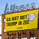 Greenpeace Netherlands activists hang a large banner reading ‘Don’t Go Deep with Trump’ on the front of Allseas’ oﬃce building in Delft, while others place a giant octopus in front of the office. The protest urges the company to reject deep-sea mining and stop working with the U.S. government.