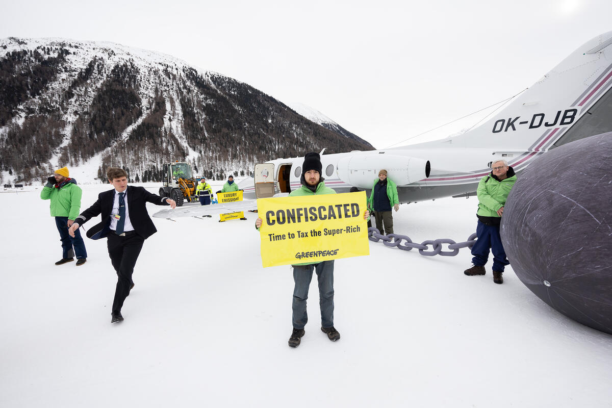Action to Symbolically “Confiscate” WEF Participants Private Planes in Switzerland. © Daniel Müller / Greenpeace
