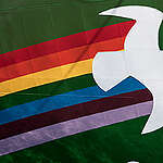 Detail of the peace dove and rainbow emblem at the bow of Greenpeace's new flagship, the Rainbow Warrior III, at the Broadway Pier in Fell's Point.