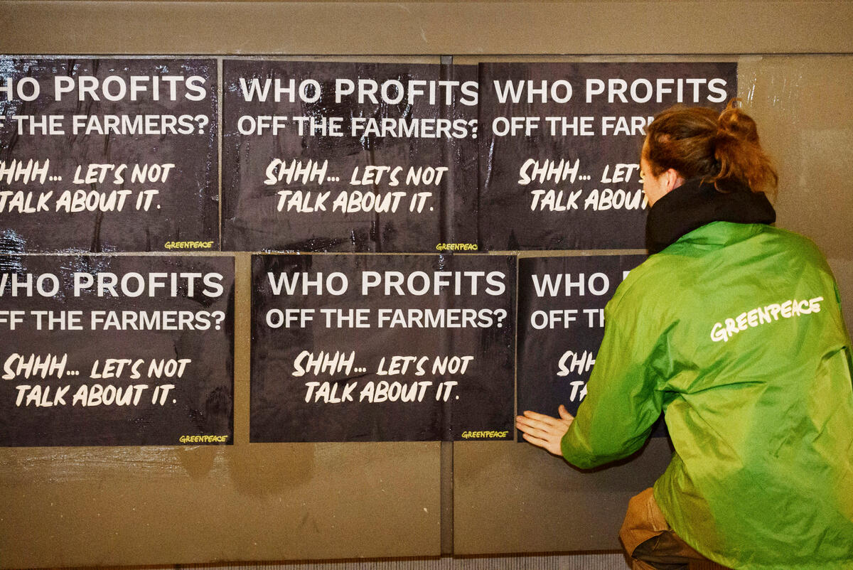 Greenpeace Belgium activists put up posters reading “Who profits off farmers? Shhh... Let’s not talk about it” on the headquarters of interest groups and political parties upholding the system that penalises small and medium scale farmers. Before dawn, activists pay a visit to the European People's Party (EPP), the European confederation of farming lobbies COPA-COGECA, retail and wholesale lobby EuroCommerce and the industry federation FoodDrinkEurope.