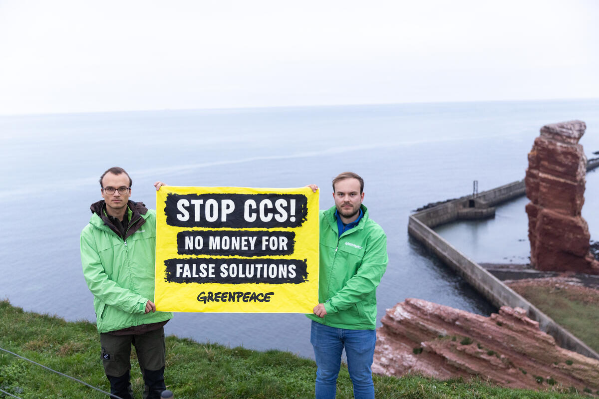 Greenpeace activists protest against the planned final storage of CO2 in the sea with a projection on the Heligoland cliffs. According to the German government's plans, carbon dioxide from industrial processes is to be stored in underground rock layers under the North Sea. Greenpeace criticizes these plans as risky, expensive and inefficient.