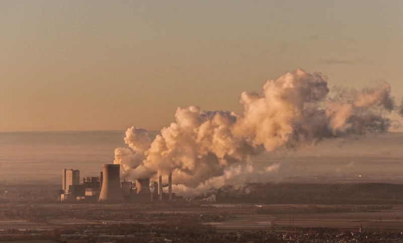 Aerial photo of coal fired power station Niederaussem near Bergheim in the Rhenish lignite mining area. Steam coming out of cooling towers. Power Station is owned by RWE Power AG.Luftaufnahme des Braunkohlekraftwerks Niederaussem, ein von der RWE Power AG mit Braunkohle betriebenes Grundlastkraftwerk in Bergheim-Niederaussem,  im Rheinischen Braunkohlerevier. Dampf steigt aus Kuehltuermen auf.