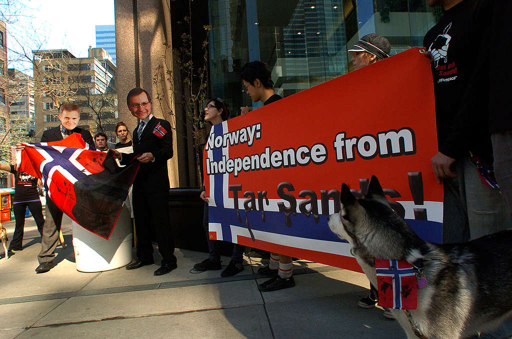 Greenpeace "Celebrates" Norwegian Day at Statoil Headquarters Calgary. © Greenpeace / Matthew Dupuis