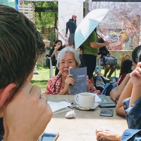 Merle. M. Alunan reads from her edited Waray collection, “Tinalunay”. © Greenpeace / Amrekha Sharma