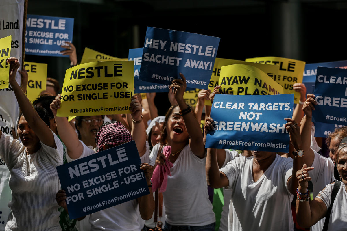 Activists March at Nestle HQ in the Philippines. © Basilio H. Sepe / Greenpeace