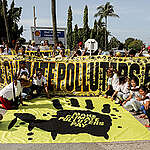 Communities march to Shell terminal, demand fossil fuel industry to ‘pay up’ for climate loss and damage