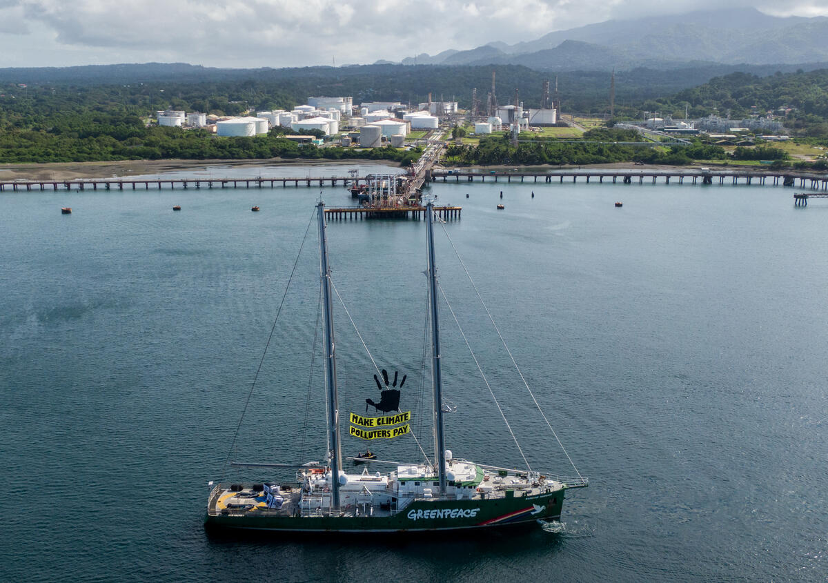 Greenpeace activists, Rainbow Warrior block Shell import terminal in support of climate-impacted communities. © Chris J Ratcliffe / Greenpeace