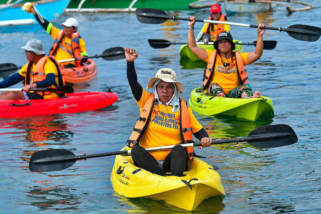 Filipino Climate Survivors Sue Shell for Typhoon Odette - Activity in Bohol. © Victor Kintanar / Greenpeace Filipino Climate Survivors Sue Shell for Typhoon Odette - Activity in Bohol. © Victor Kintanar / Greenpeace
