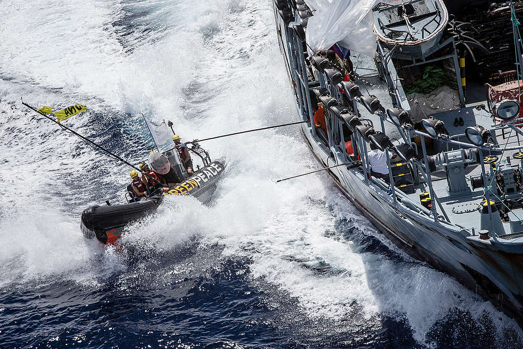 Activists Confront Supply Vessel Explorer II in the Indian Ocean. © Will Rose / Greenpeace Activists Confront Supply Vessel Explorer II in the Indian Ocean. © Will Rose / Greenpeace