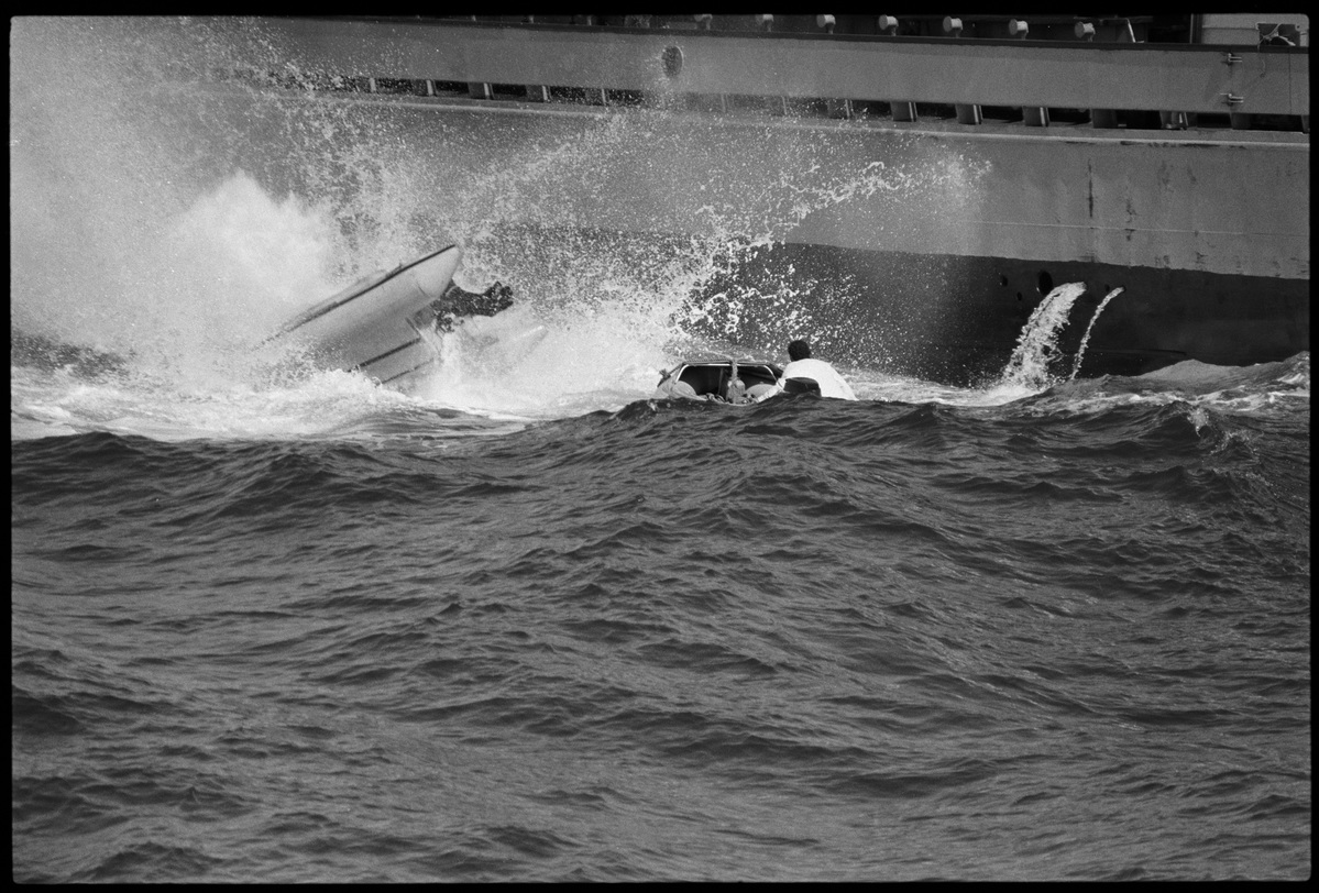Nuclear Waste Barrel Hits Inflatable. © Greenpeace / Pierre Gleizes