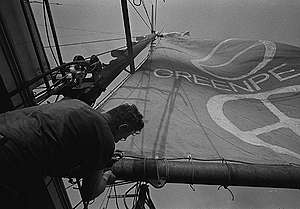 Dave Birmingham raises Greenpeace sail on Phyllis Cormack. © Greenpeace / Robert Keziere