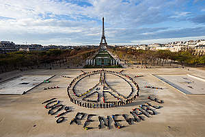 Eiffel Tower Human Aerial Art in Paris. © Yann Arthus-Bertrand / Spectral Q