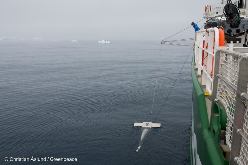 Hope Bay, Antarctic.Microplastic sampling in Antarctic waters from aboard the Arctic Sunrise. Sandra Schoettner, marine biologist and oceans campaigner with Greenpeace Germany and crew deploying the so-called manta trawl – a net specifically designed for skimming small particles from the sea surface whilst being towed alongside the ship. Greenpeace has already performed this kind of sampling in many other marine environments, including very remote as well as highly impacted places.