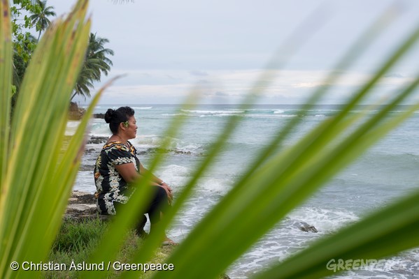 Tarawa Island, Kiribati, Pacific OceanPenelise Alofa has been working on climate change issues for the almost ten years in Kiribati as the National Coordinator of the Kiribati Climate Action Network. Penelise has visited many Kiribati islands to document the impacts of rising sea-levels on Kiribati communities, such as salt water intrusion into drinking water and the soil. She jokes that global fossil fuel companies should either stop contributing to climate change and making sea levels rise, or build a “new or better” island for her and all Kiribati people to live on.