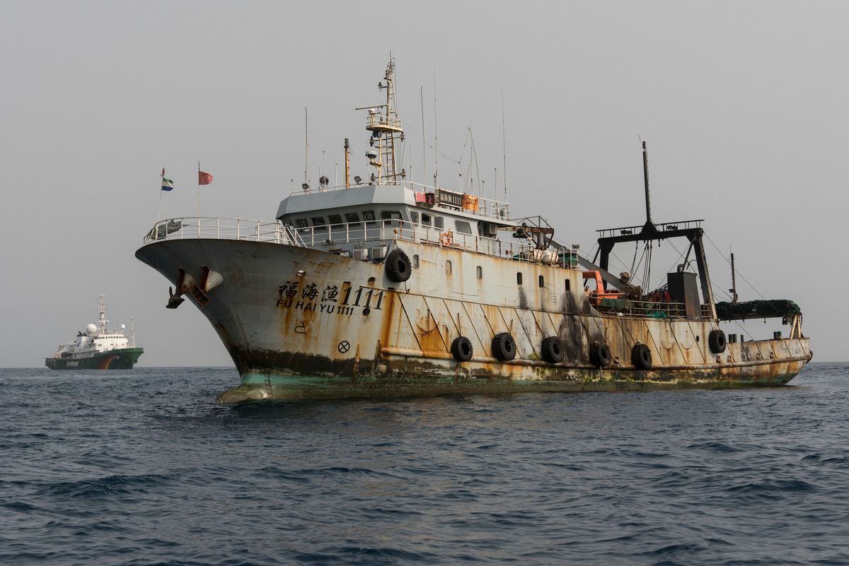 Inspection of Chinese Fishing Vessel in Sierra Leone. © Pierre Gleizes / Greenpeace