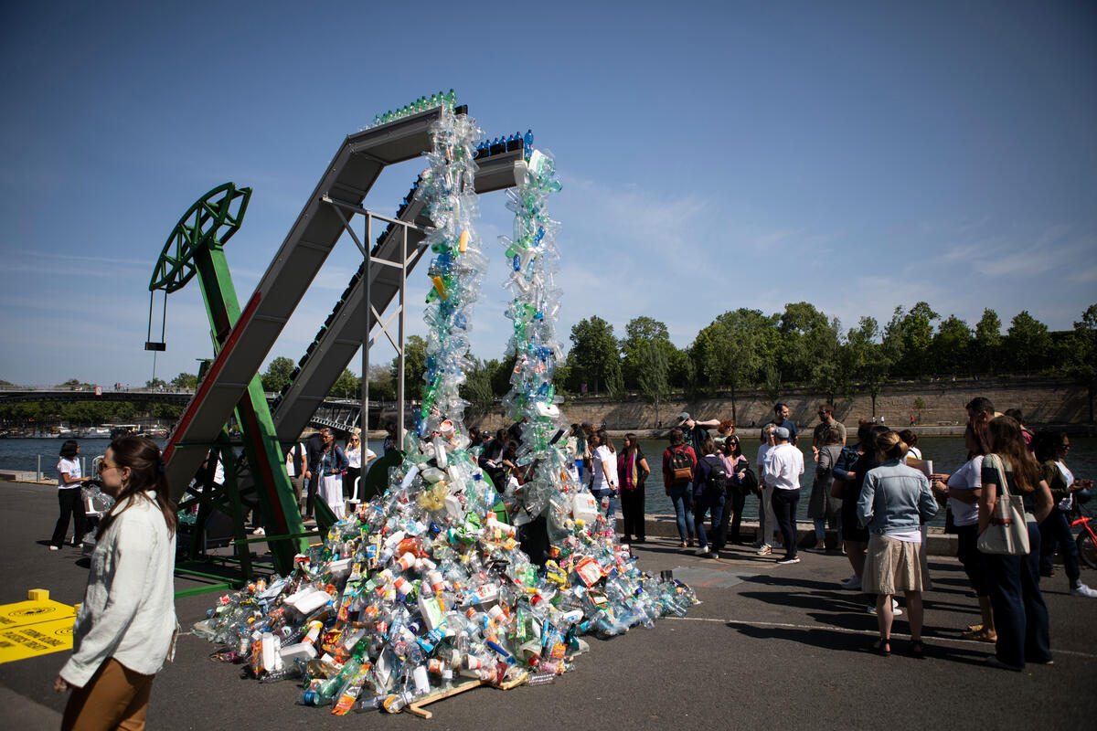 Greenpeace unveils giant art installation ahead of Global Plastic Treaty negotiations in Paris. © Noemie Coissac / Greenpeace