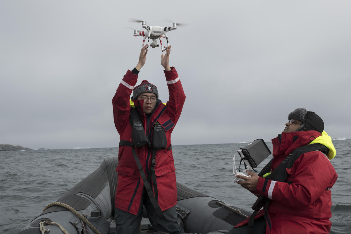 Yang Liu and Vikrant Shah Off Anvers Island. © Christian Åslund / Greenpeace