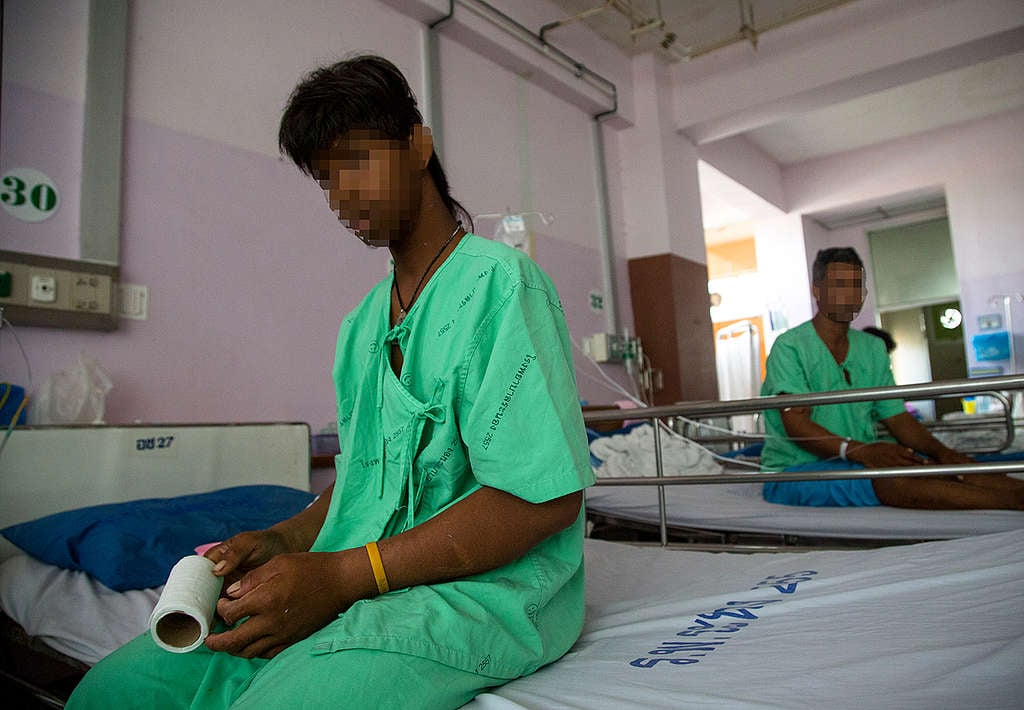 Cambodian Fisherman at Hospital in Thailand. © Chanklang  Kanthong / Greenpeace