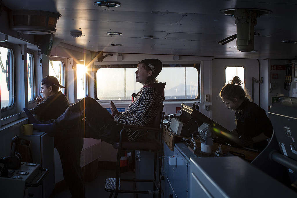 Crew on MY Esperanza in Svalbard. © Will Rose / Greenpeace