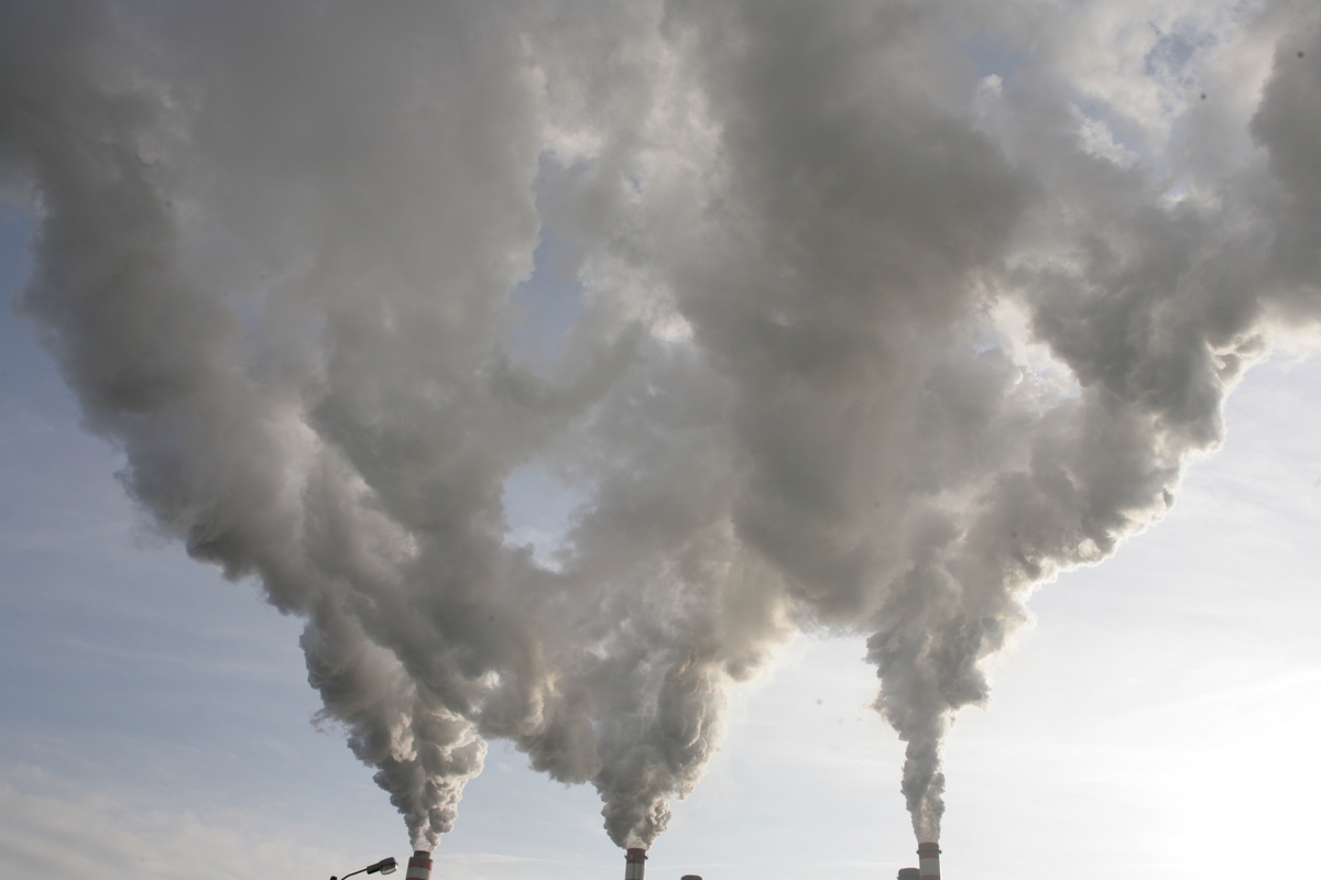 Smoke Belching from the Patnów Coal Plant's Chimney in Poland. © Greenpeace / Nick Cobbing