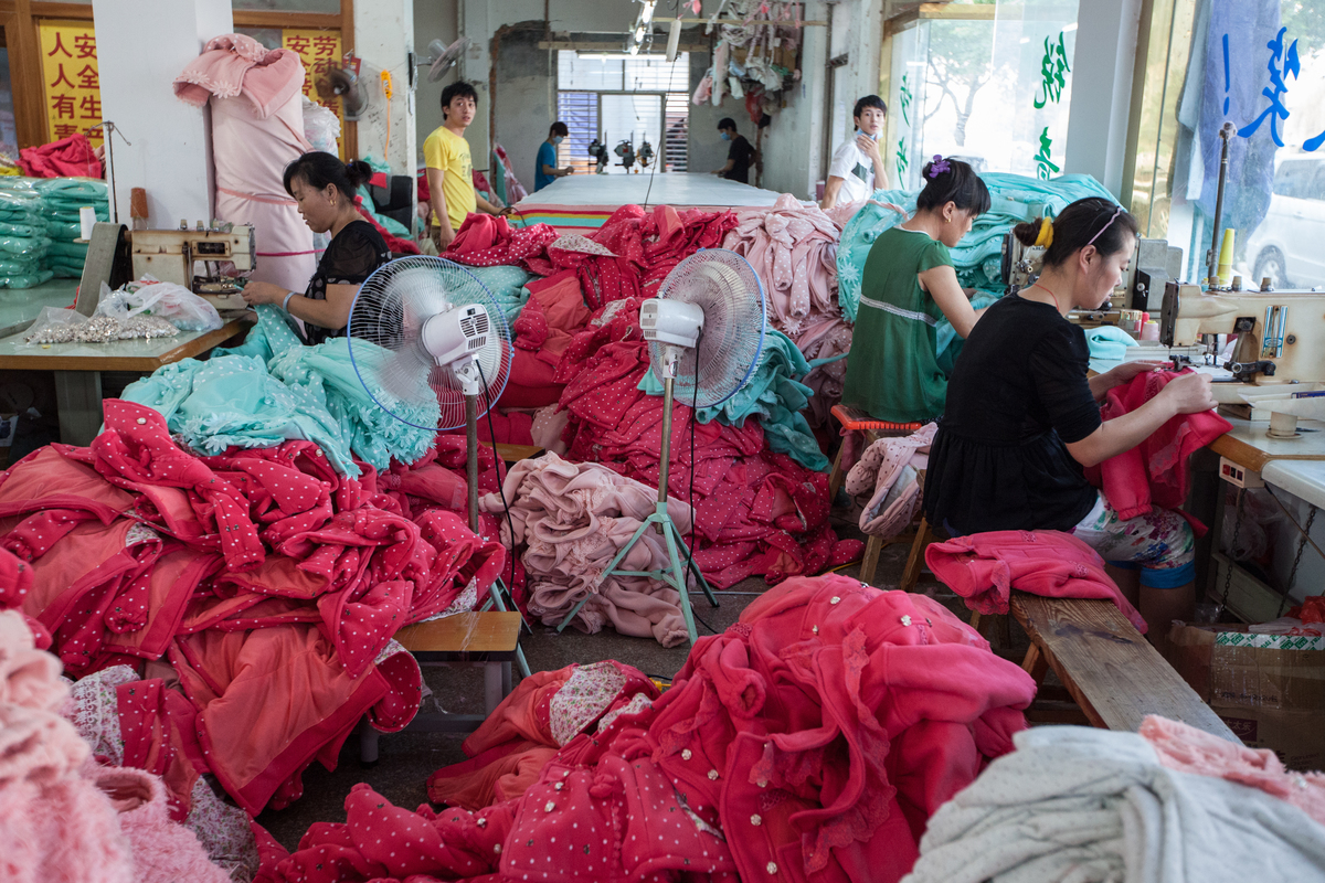 Workers at a Textile Factory in China. © Jeff Lau / Greenpeace