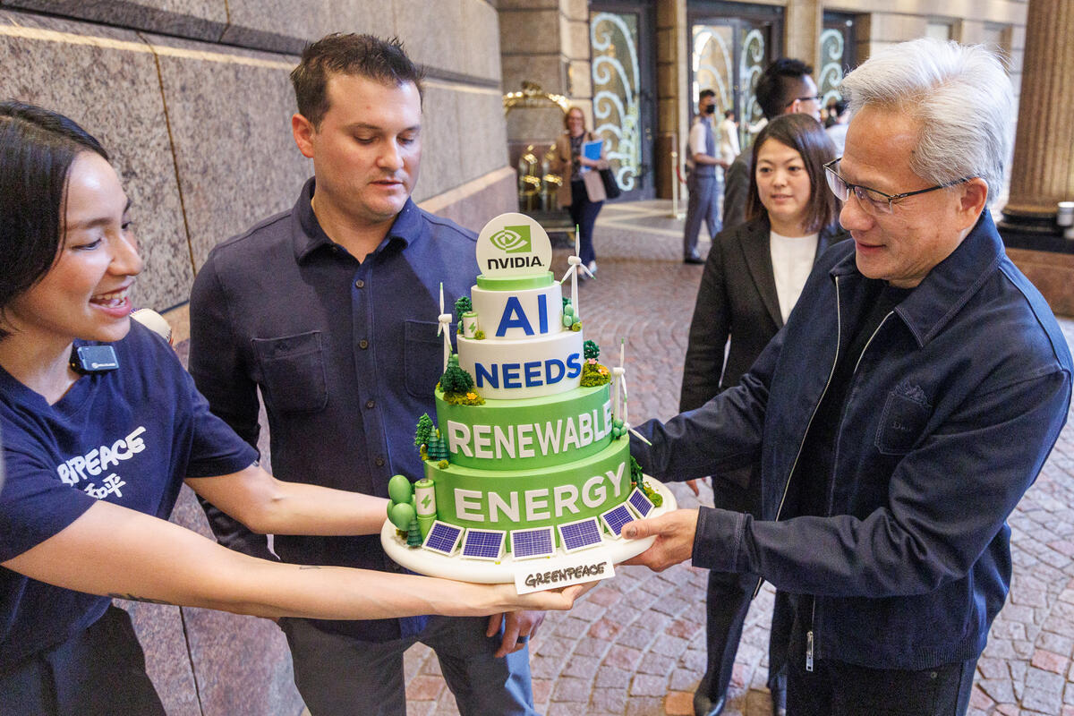 As US semiconductor giant NVIDIA kicks off its GTC AI conference in Taipei, Greenpeace East Asia activists confronted CEO Jensen Huang face-to-face, demanding that the AI chip leader and its billionaire founder take responsibility for the soaring energy demands and carbon emissions across its supply chain, especially in the East Asian manufacturing hub Taiwan where most of its hardware is produced.
