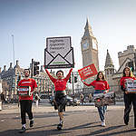 Plastic Petition Hand in at Downing Street. © Suzanne Plunkett / Greenpeace