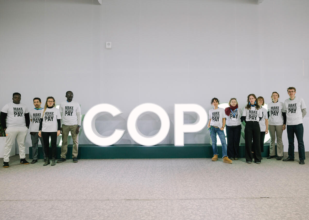 Portrait of 'Make Polluters Pay' Delegation at COP29 in Baku. © Marie Jacquemin / Greenpeace