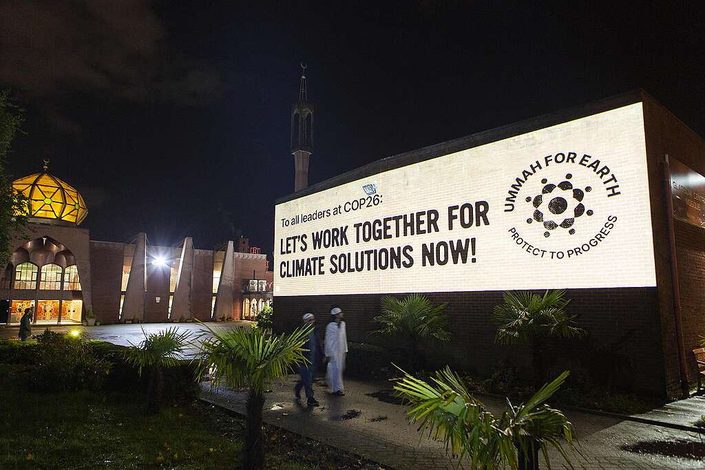 Screening of the Ummah For Earth alliance in front of Glasgow's central mosque during COP26. That week, Islamic Relief & Greenpeace Middle East North Africa joined together on behalf of the alliance to "green" the largest mosque in Scotland, Glasgow Central Mosque, installing 130 solar panels in hopes of significantly reducing CO2 emissions.