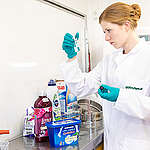 Greenpeace expert examines Italian detergents for microplastics in a mobile laboratory at the Greenpeace warehouse in Hamburg.