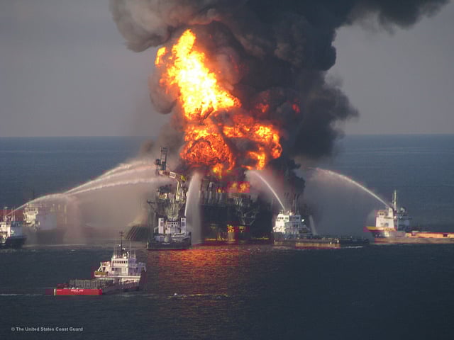 Fire boat response crews battle the blazing remnants of the off shore oil rig Deepwater Horizon. Multiple United States Coast Guard helicopters, planes and cutters responded to rescue the BP Deepwater Horizon's 126 person crew. Eleven workers died and millions of barrels of crude oil gushed into the Gulf in worst oil spill in United States history.