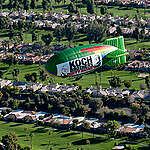 The Greenpeace Airship A.E. Bates flies over the location of oil billionaires David and Charles Koch's latest secret political strategy meeting, with a banner reading "Koch Brothers: Dirty Money." The aerial message is directed to arriving attendees of the meeting and highlights the Koch Brothers’ ongoing use of their vast oil profits to push a polluter agenda through campaign contributions, lobbying, and funding fronts groups and think tanks.