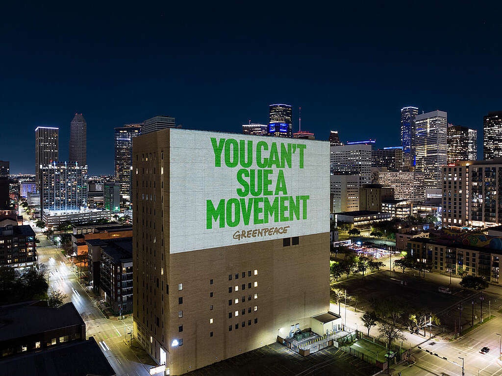 SLAPP 'We Will Not Be Silenced' Projections in Houston. © Greenpeace