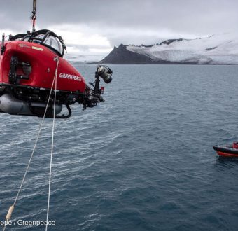 Dr Susanne Lockhart from the California Academy of Sciences and John Hocevar (not seen in the photo), Oceans Campaign Director for Greenpeace USA and submersible pilot, during a dive launch off Half Moon Island, Antarctica.
