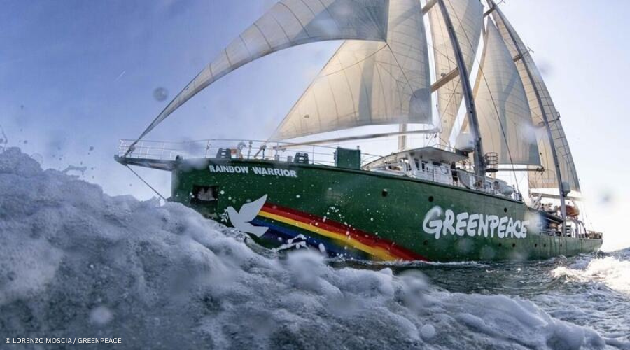 The Rainbow Warrior ship on the water