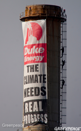 Greenpeace activists protesting the destruction and pollution caused by coal at the Progress Asheville Power Station hang with a banner at the plant February 13, 2012. Activists have secured themselves to the coal loader and conveyers, which will prevent coal from entering the facility. The Progress Energy owned Asheville Power Station uses the most destructive form of coal mining, mountain top removal, which is flattening mountains across Appalachia. The plant produces 1,994 pounds of sulfur dioxide, 788 pounds of nitrogen oxides, and 2,629,243 tons of carbon dioxide. Its coal ash ponds are designated ‘high hazard’ by the EPA, meaning they are likely to kill people if they spill. Photo by Les Stone/Greenpeace #occupyduke